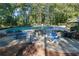 Community pool with picnic tables and lush landscaping at 2105 Country Park Dr, Smyrna, GA 30080