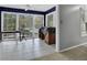 Sunroom with tiled floor and view to backyard at 2105 Country Park Dr, Smyrna, GA 30080