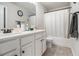 Bathroom with double vanity and bathtub at 220 Seth Ter, Mcdonough, GA 30252