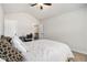 This bedroom offers ample space, natural light, and a ceiling fan at 220 Seth Ter, Mcdonough, GA 30252