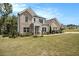 Two-story brick house with landscaped yard at 220 Seth Ter, Mcdonough, GA 30252