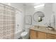 Bright bathroom featuring a shower, bathtub and granite countertop at 563 Memorial Se Dr # 211, Atlanta, GA 30312