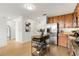 Kitchen featuring stainless steel appliances, wood cabinets, and light hardwood floors at 563 Memorial Se Dr # 211, Atlanta, GA 30312