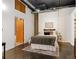 Spacious bedroom with a cozy bed and exposed ductwork at 660 Glen Iris Ne Dr # 204, Atlanta, GA 30308