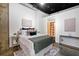 Primary bedroom with built-in shelving and stylish decor at 660 Glen Iris Ne Dr # 204, Atlanta, GA 30308