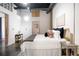 Bright bedroom with large bed and neutral color scheme at 660 Glen Iris Ne Dr # 204, Atlanta, GA 30308