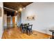 Small dining area with hardwood floors and simple decor at 660 Glen Iris Ne Dr # 204, Atlanta, GA 30308