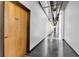 Building hallway with concrete floors and wood doors at 660 Glen Iris Ne Dr # 204, Atlanta, GA 30308