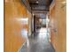 Interior hallway with wood sliding doors and concrete floors at 660 Glen Iris Ne Dr # 204, Atlanta, GA 30308