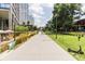 Community walkway with green space and city views at 660 Glen Iris Ne Dr # 204, Atlanta, GA 30308