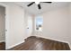 Bright bedroom with hardwood floors and ceiling fan at 1303 Rocksprings St, Atlanta, GA 30297