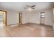 Roomy bedroom with a ceiling fan and access to other rooms at 170 Pebble Path, Douglasville, GA 30134