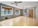 Well-lit bedroom with ample natural light and ceiling fan at 170 Pebble Path, Douglasville, GA 30134