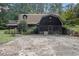 Ranch style home with a large yard and screened porch at 170 Pebble Path, Douglasville, GA 30134
