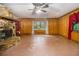 Living room with a large window and stone fireplace at 170 Pebble Path, Douglasville, GA 30134