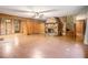 Living area showcasing a stone fireplace and wood paneling at 170 Pebble Path, Douglasville, GA 30134