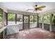 Screened porch overlooking the backyard at 170 Pebble Path, Douglasville, GA 30134