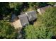 Aerial view of home with mature landscaping at 3956 Carriage Gate Dr, Duluth, GA 30096