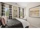 Charming bedroom with window seating and black and white decor at 12 Jacobs Farm Ln # 6, Lawrenceville, GA 30045