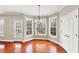 Bright breakfast nook with hardwood floors and large windows at 2812 Havenwood Dr, Conyers, GA 30094