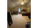 Spacious bedroom with large bed and recliner chairs at 331 Overlook Turn Northwest, Conyers, GA 30012