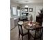 Kitchen dining area with glass table and home office at 331 Overlook Turn Northwest, Conyers, GA 30012