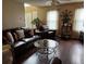 Living room with hardwood floors, fireplace and large windows at 331 Overlook Turn Northwest, Conyers, GA 30012