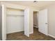 Spacious bedroom closet with double doors and ample shelving at 5377 Martins Crossing Rd, Stone Mountain, GA 30088