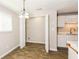 Dining area with tile floors and built-in storage at 5377 Martins Crossing Rd, Stone Mountain, GA 30088