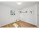 Charming bedroom with hardwood floors and built-in shelving at 1714 Fort Valley Sw Dr, Atlanta, GA 30311