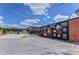 Parking lot with mural and building exterior at 1714 Fort Valley Sw Dr, Atlanta, GA 30311