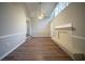Bright living room featuring a fireplace, wood floors, and abundant natural light from high windows at 2980 Laguna Dr, Decatur, GA 30032