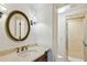 Bathroom featuring a glass shower and marble countertop at 1031 Eulalia Ne Rd, Atlanta, GA 30319