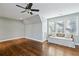 Bright bedroom features a large window and window seat and beautiful hardwood floors at 1031 Eulalia Ne Rd, Atlanta, GA 30319