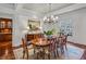 Formal dining room with hardwood floors, a chandelier, and access to the outdoor space at 1031 Eulalia Ne Rd, Atlanta, GA 30319