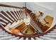 Overhead view of the winding staircase with a statement chandelier at 1031 Eulalia Ne Rd, Atlanta, GA 30319