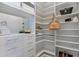 Luxurious closet featuring abundant shelving for clothing and accessories at 2425 Peachtree Road # 1008, Atlanta, GA 30305