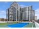 Luxury building with modern tennis court and rooftop amenities at 2425 Peachtree Road # 1008, Atlanta, GA 30305