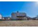 Two-story home with a deck and staircase in the backyard provides outdoor living space at 287 Jenna Ln, Dallas, GA 30157