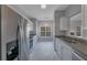 Bright kitchen featuring stainless steel appliances, ample counter space, and modern white cabinets at 287 Jenna Ln, Dallas, GA 30157