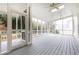 Large screened porch with lots of natural light and views of the backyard at 1069 Saint James Ne Xing, Atlanta, GA 30319