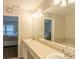 Spacious bathroom with double vanity and large mirror at 5800 Oakdale Rd # 103, Mableton, GA 30126