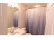 Clean bathroom with shower/tub combo and updated vanity at 5800 Oakdale Rd # 103, Mableton, GA 30126