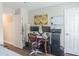 Bedroom with home office and hardwood floors at 5800 Oakdale Rd # 103, Mableton, GA 30126
