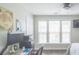 Bright bedroom with large windows, home office setup at 5800 Oakdale Rd # 103, Mableton, GA 30126