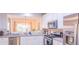 Modern kitchen with stainless steel appliances and white cabinets at 5800 Oakdale Rd # 103, Mableton, GA 30126
