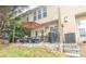 Back patio with seating area and grill, steps leading down at 5800 Oakdale Rd # 103, Mableton, GA 30126