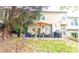Elevated back patio with seating area and grill at 5800 Oakdale Rd # 103, Mableton, GA 30126