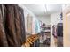 Large walk-in closet with ample hanging and shelving at 5800 Oakdale Rd # 103, Mableton, GA 30126
