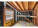 Unfinished basement area with window and shelving at 108 Woodhaven Dr, Stockbridge, GA 30281